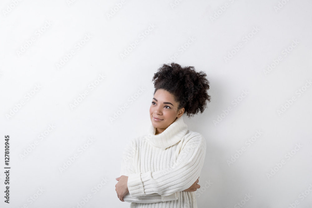 Portrait of a young woman in white turtleneck, copy space Portrait of a young woman in white turtleneck, copy space