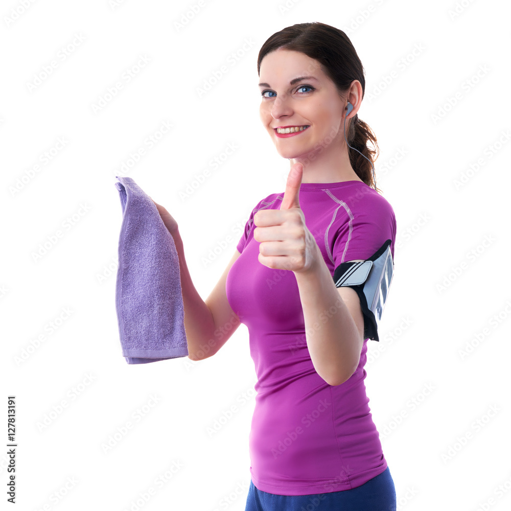Smiling sporty woman in violet T-short over white isolated background Smiling sporty woman in violet T-short over white isolated background