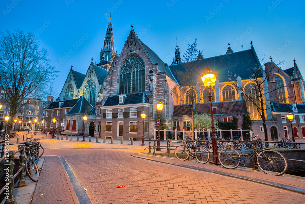 Fototapeta premium The Oude Church in Amsterdam City, Netherlands