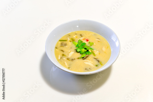 COCONUT MILK SOUP WITH CHICKEN (om kha kai) isolated on white background