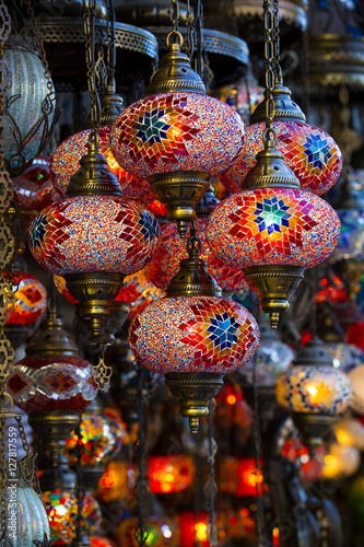 Traditional Asian lanterns of colored glass on the market © lester120