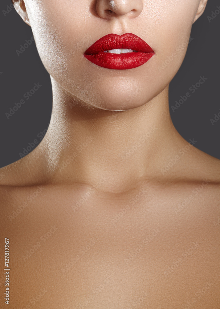 Close-up of female lips with bright makeup. Macro of woman's face. Fashion lip make-up with red gloss Close-up of female lips with bright makeup. Macro of woman's face. Fashion lip make-up with red gloss