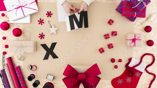 Video with creative female preparing for christmas holiday
