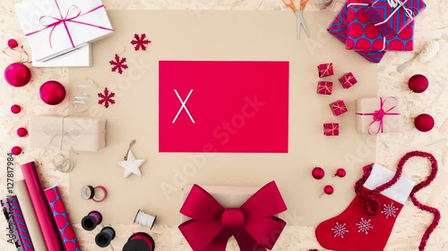 Video with seasonal red card with writing merry xmas
