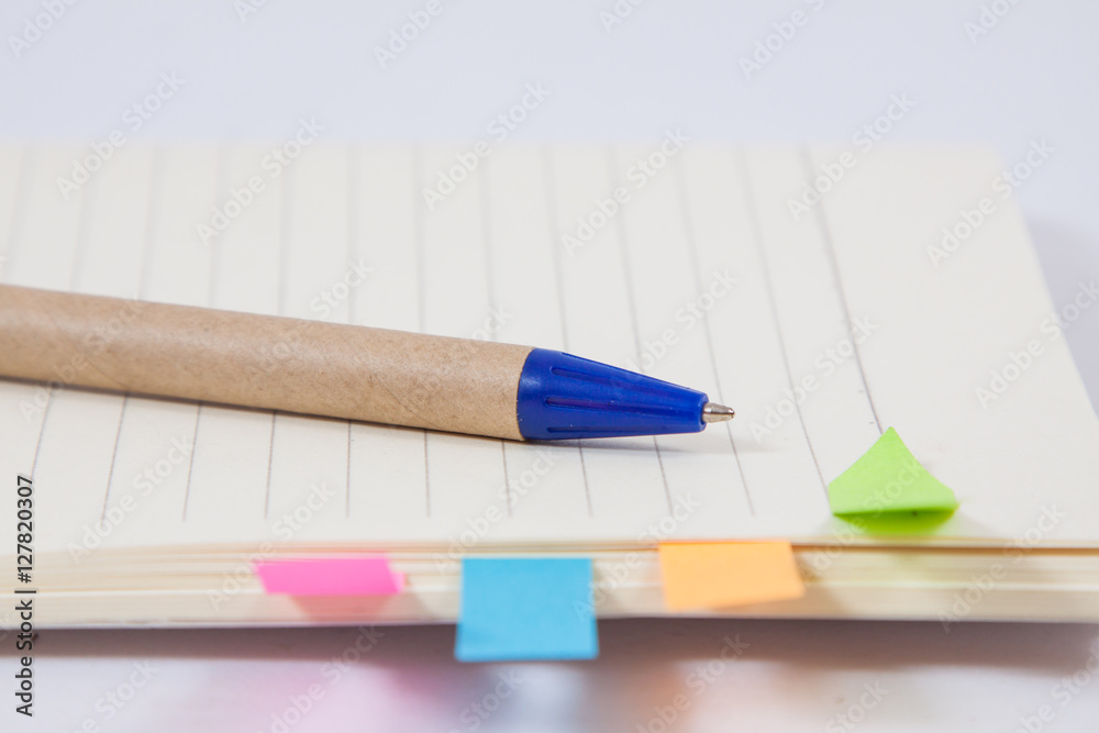 image of a notebooks and pencil on white background