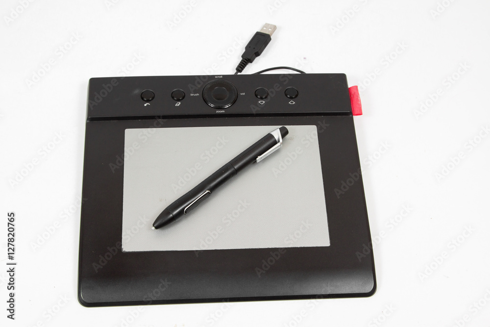 Digital, graphic tablet and pen isolated on white Digital, graphic tablet and pen isolated on white