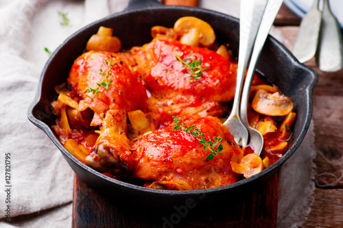 Marengo chicken in a frying pan. . selective focus