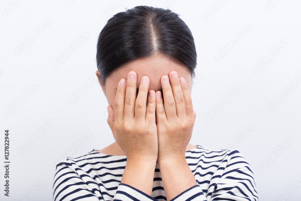 Woman close her face by hand Woman close her face by hand