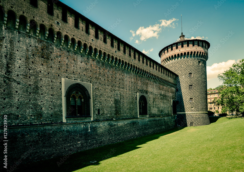 view of Sforza Castle Sempione Park Milan city  - wall and tower