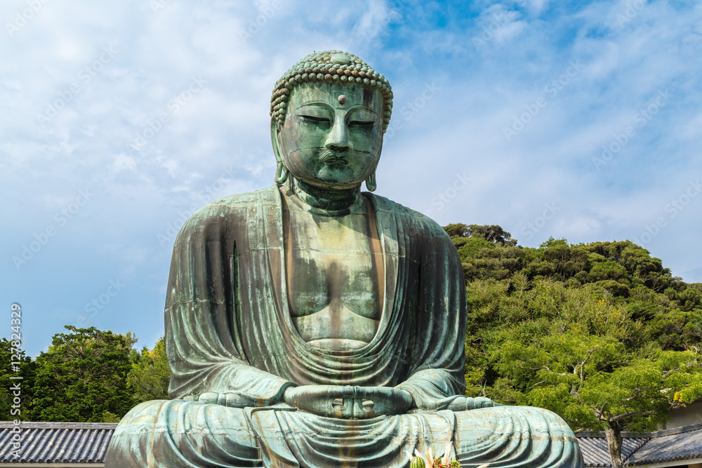 It is the Great Buddha of Kamakura, which is surrounded by the green of the leaves. I photographed the Great Buddha in Japan Kamakura, Kanagawa Prefecture. It is the Great Buddha of Kamakura, which is surrounded by the green of the leaves. I photographed the Great Buddha in Japan Kamakura, Kanagawa Prefecture.