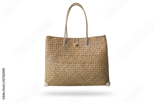 Brown handmade nature bag made from dry water hyacinth isolated