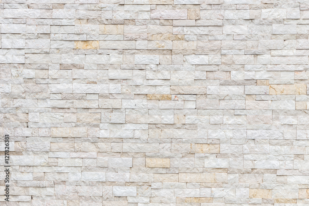 Pattern of grey and rough sandstone wall texture and background