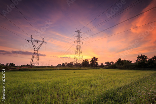 High voltage electric tower and beautiful sunrise