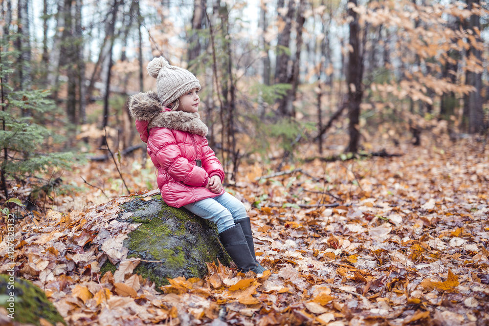 kid girl in autumne season wearing a hat kid girl in autumne season wearing a hat