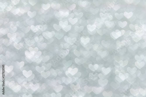 defocused abstract white hearts light background