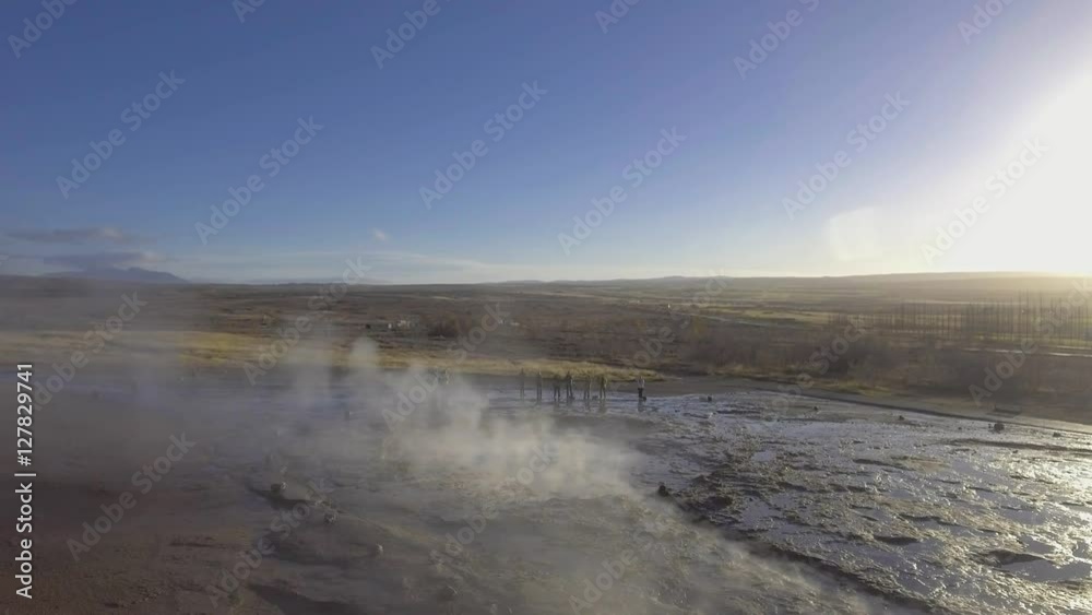 Low level aerial view of Strokkur geyser erupting Low level aerial view of Strokkur geyser erupting