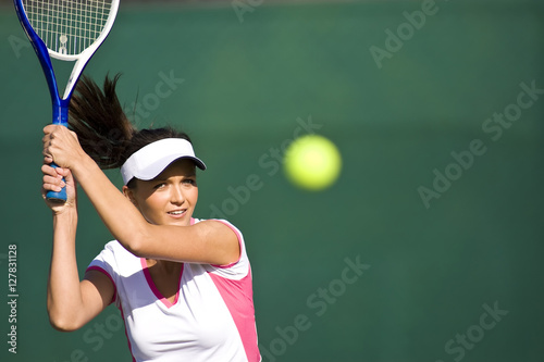 Tennis Player follows ball with eyes