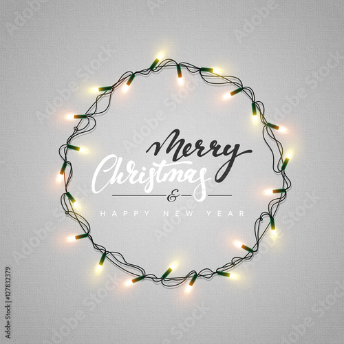 Glowing Christmas Lights Wreath for Xmas Holiday Greeting Cards Design. Merry Christmas Lettering label. Glowing lights Garlands Xmas Holiday greeting card design