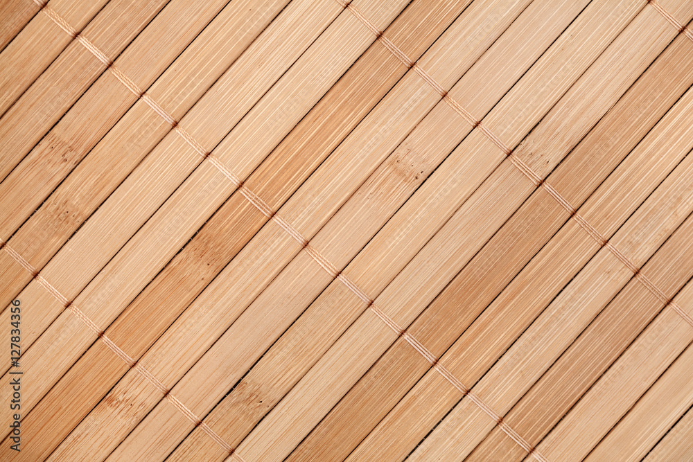 Obraz premium Bamboo napkin background, top view, copy space