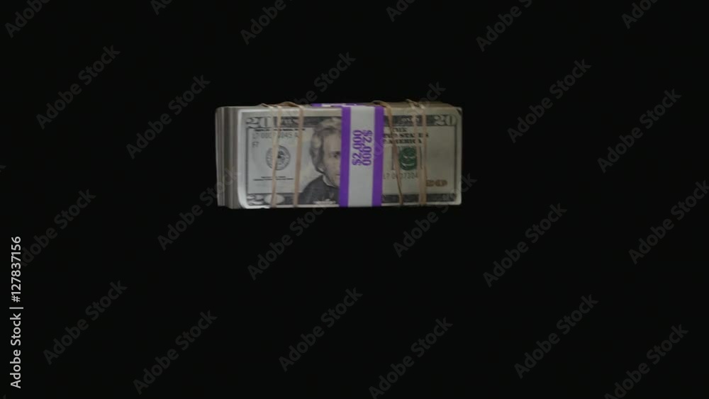 Floating money and hands trying to catch it. Dramatic light and black background. Floating money and hands trying to catch it. Dramatic light and black background.