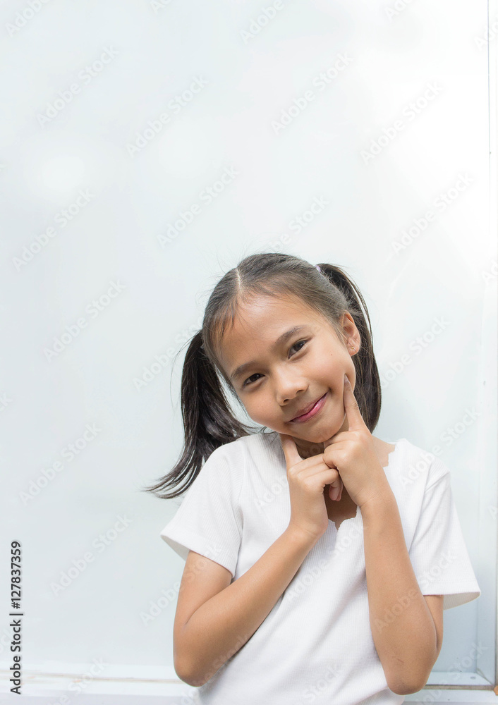 The kid girl enjoy ,feeling acting , Asian girl ,happiness The kid girl enjoy ,feeling acting , Asian girl ,happiness