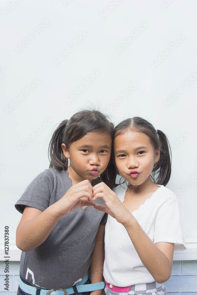 The kid girl enjoy ,feeling acting , Asian girl ,happiness The kid girl enjoy ,feeling acting , Asian girl ,happiness