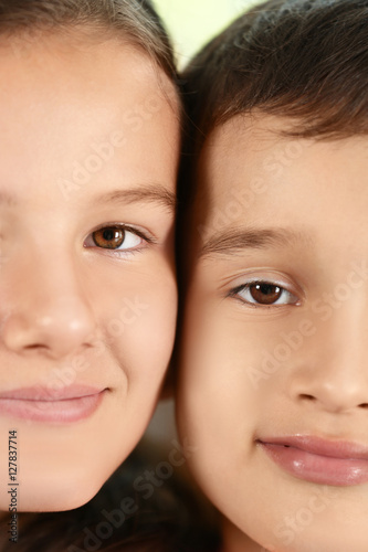 Portrait of small boy and girl