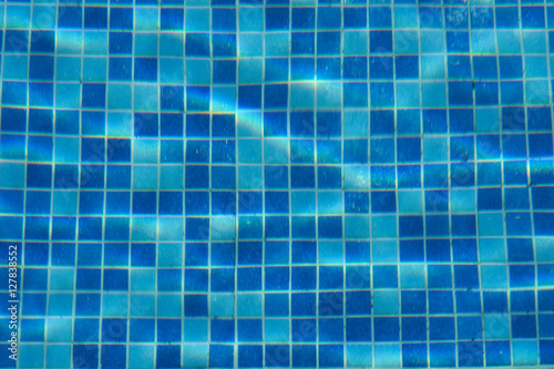 Blue swimming pool tile background