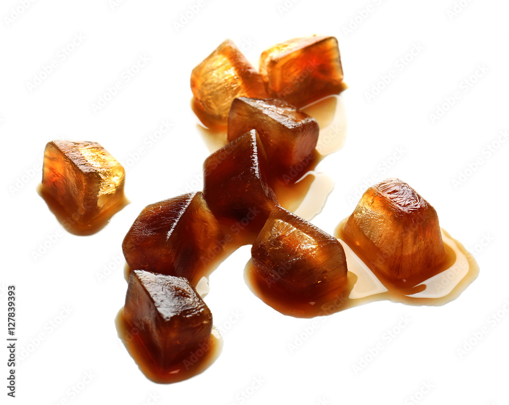 Iced coffee cubes on white background