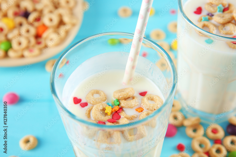 Milk shake with cereals on color background Milk shake with cereals on color background