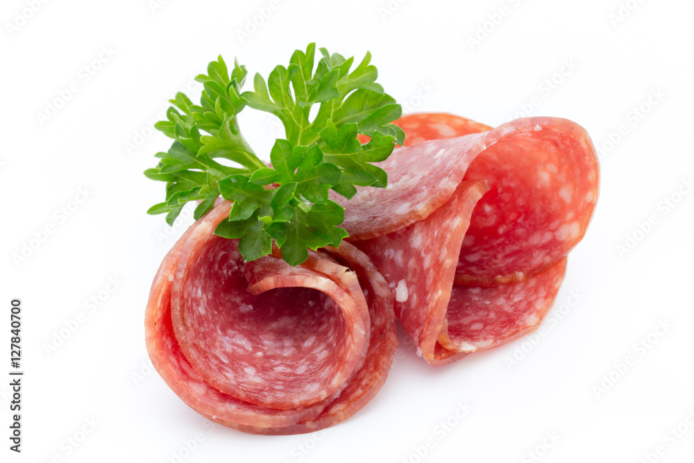 Salami smoked sausages slices isolated on white background. Salami smoked sausages slices isolated on white background.