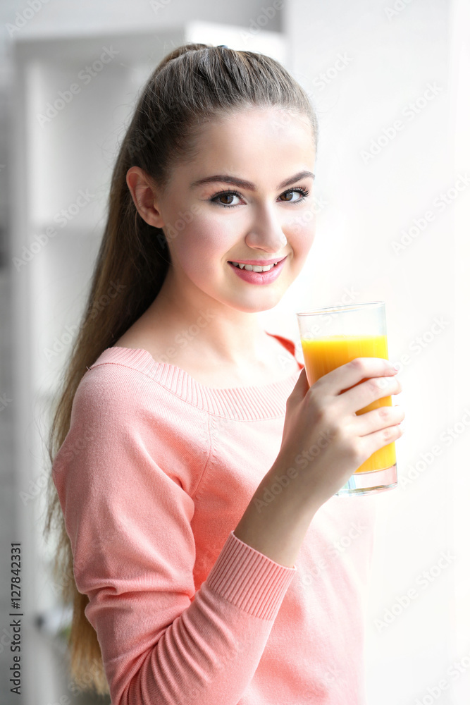 Young beautiful woman with glass of juice Young beautiful woman with glass of juice