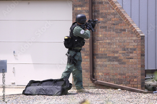 police officer pointing gun