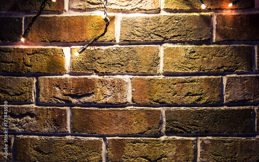 brick wall background with lights glowing Stock Photo | Adobe Stock