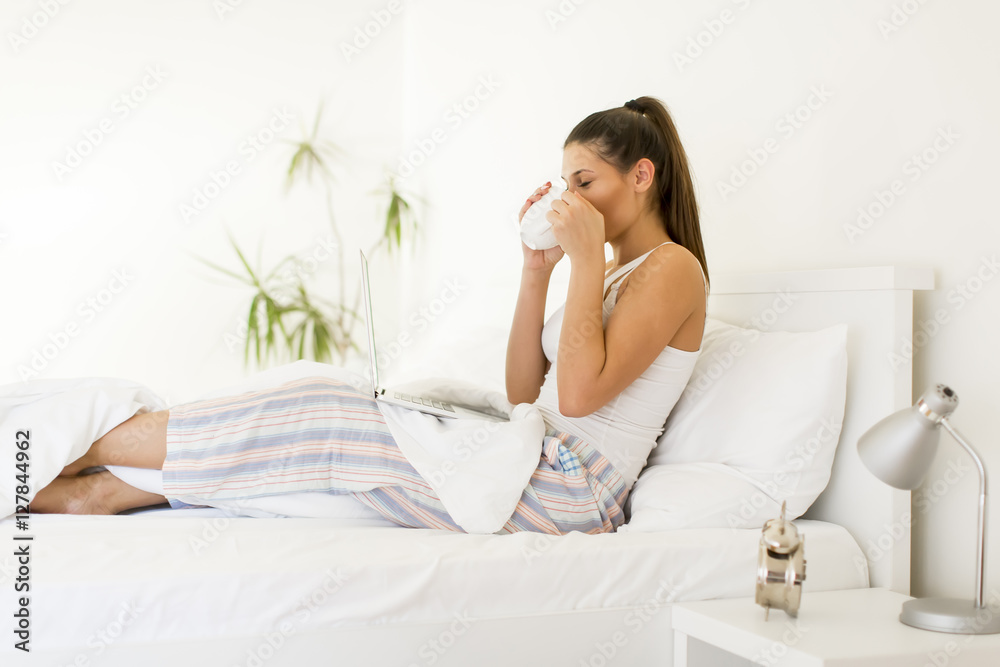 Woman in white bed Woman in white bed