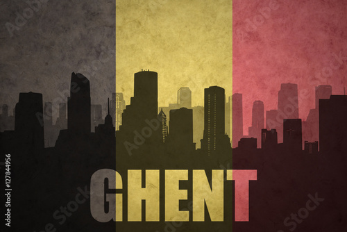 abstract silhouette of the city with text Ghent at the vintage belgian flag