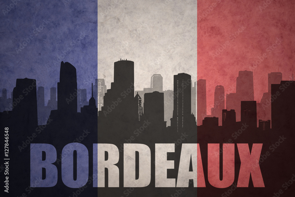 abstract silhouette of the city with text Bordeaux at the vintage french flag