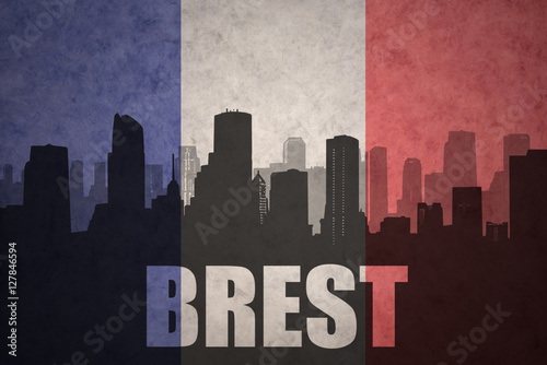 abstract silhouette of the city with text Brest at the vintage french flag
