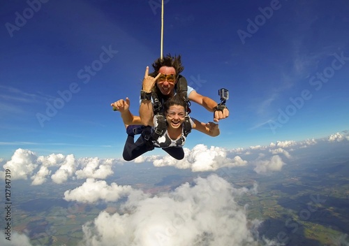 Skydiving tandem couple happy