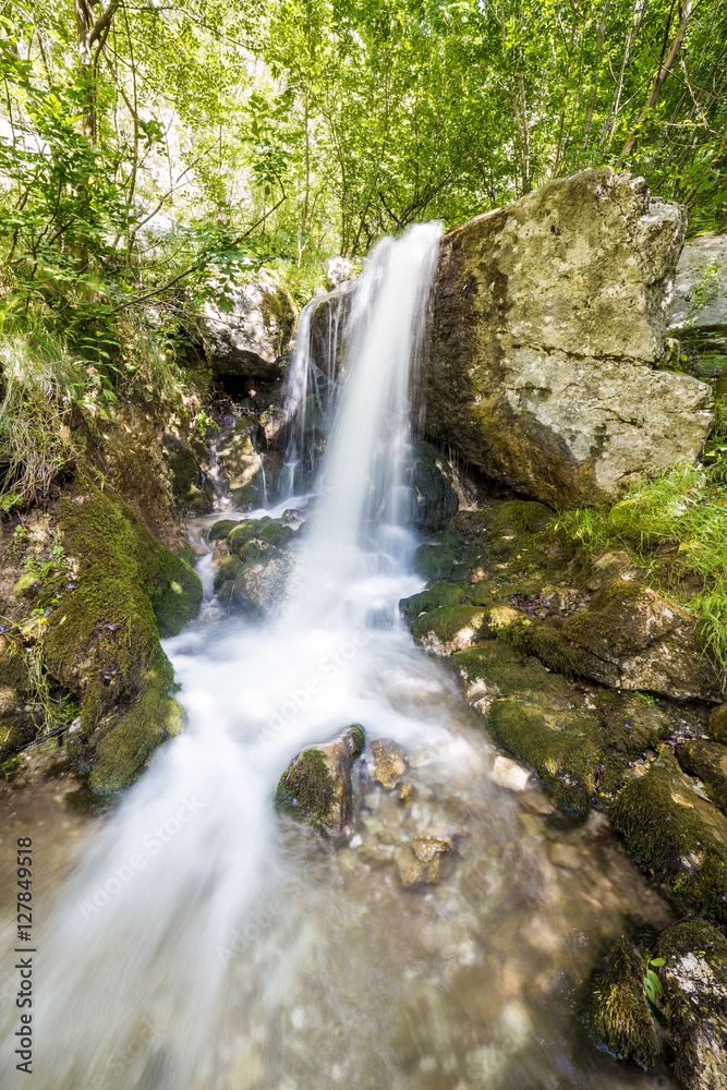 Landscape with waterfall from the mountains Landscape with waterfall from the mountains