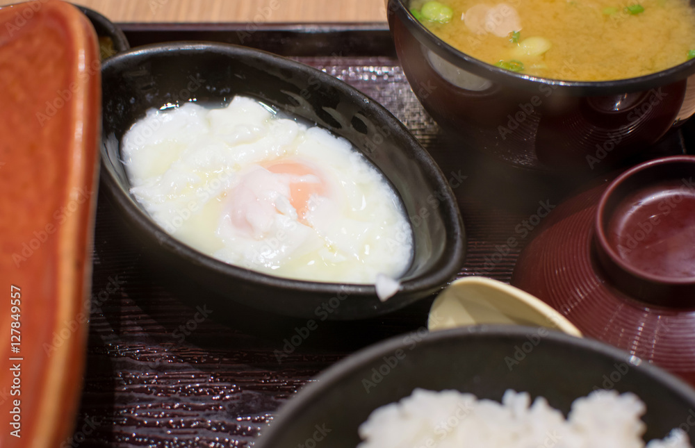 Japanese cooked egg in wooden bowl Japanese cooked egg in wooden bowl