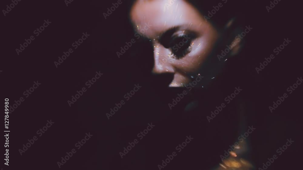 girl with glitter on her face glows in the dark girl with glitter on her face glows in the dark