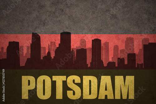 abstract silhouette of the city with text Potsdam at the vintage german flag