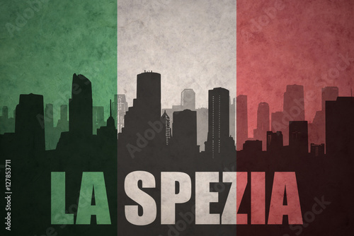 abstract silhouette of the city with text La Spezia at the vintage italian flag