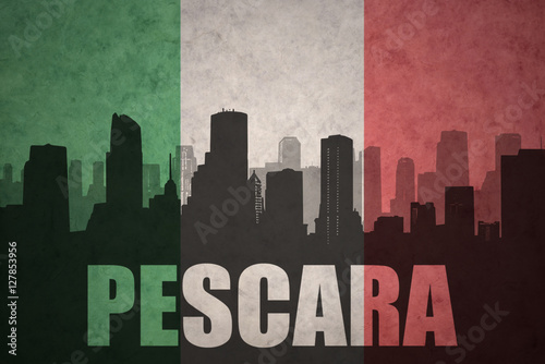 abstract silhouette of the city with text Pescara at the vintage italian flag