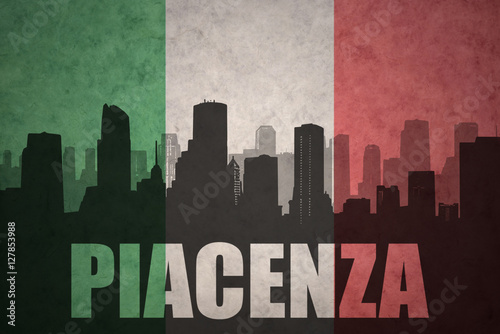 abstract silhouette of the city with text Piacenza at the vintage italian flag