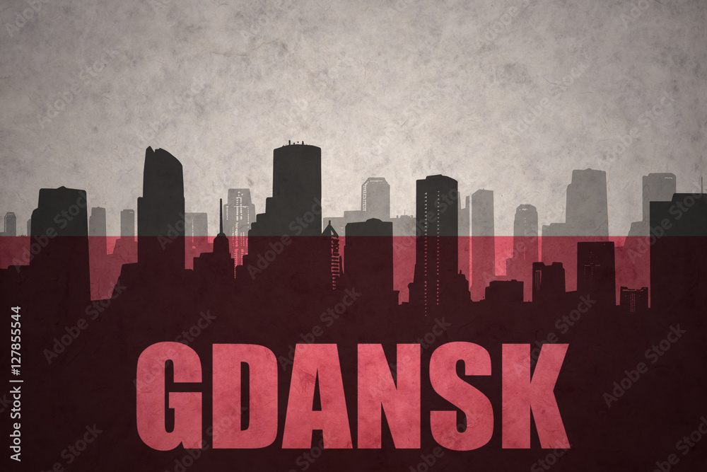abstract silhouette of the city with text Gdansk at the vintage polish flag