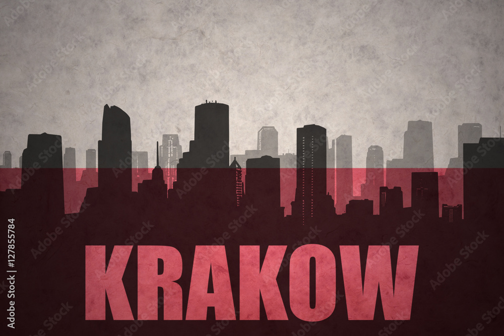 abstract silhouette of the city with text Krakow at the vintage polish flag