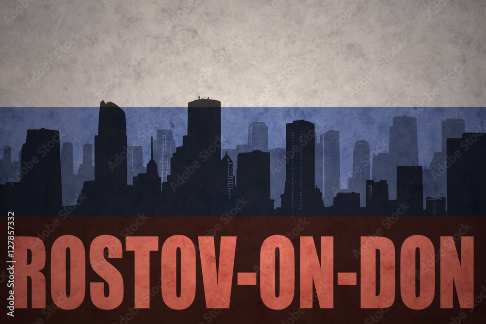 abstract silhouette of the city with text Rostov-on-Don at the vintage russian flag