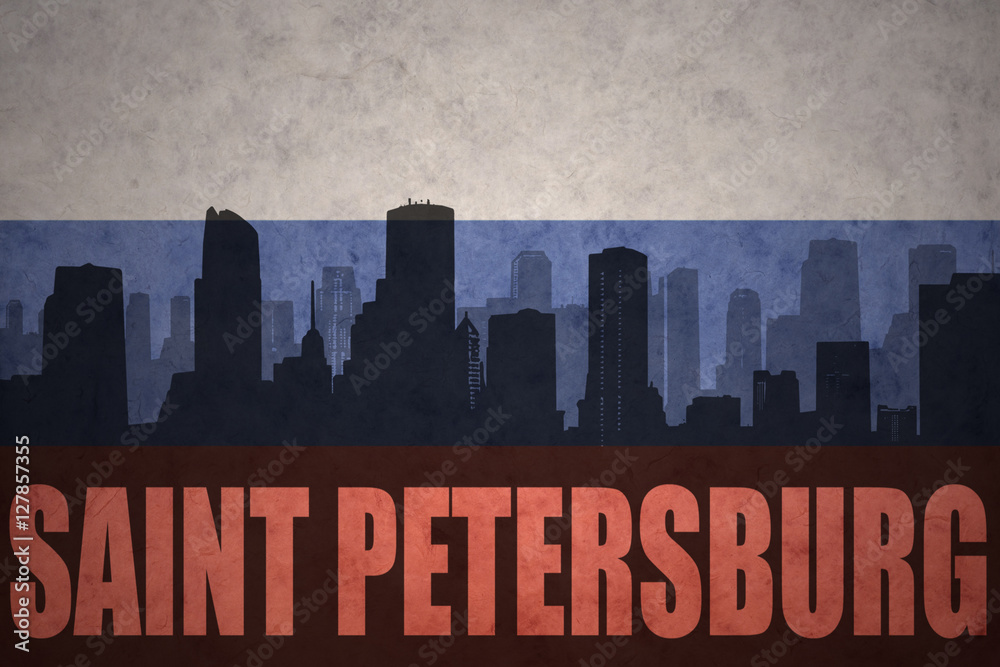 abstract silhouette of the city with text Saint Petersburg at the vintage russian flag